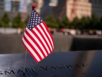 Close-up of a small American flag at the 9/11 Memorial in New York City.